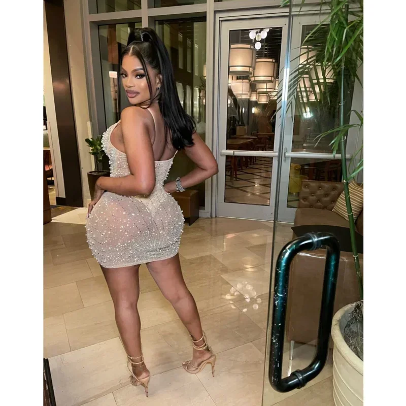 فستان عيد ميلاد GUWU مرصع بالألماس واللؤلؤ للنساء من شبكة مرصعة بأحجار الراين شفافة للحفلات الليلية فساتين قصيرة ضيقة