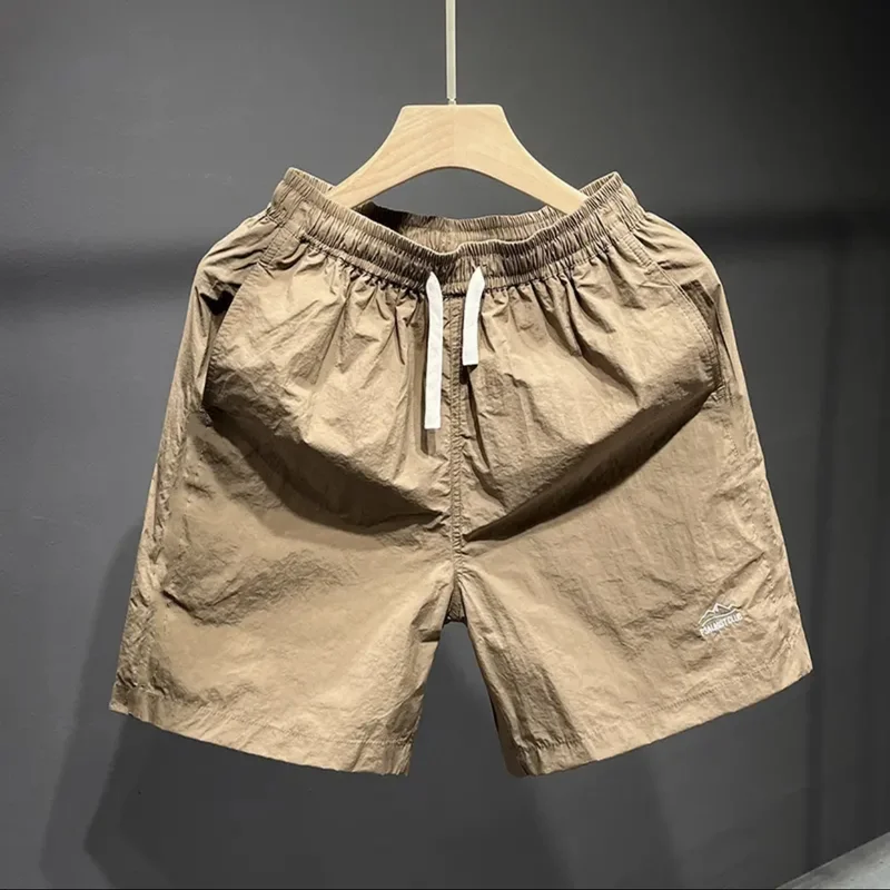 

Summer 2024 Men's Pure Color orts Qui Dry Casual Beach Five-Quarter Length Straight Leg Polyester Fiber Youth Daily Wear