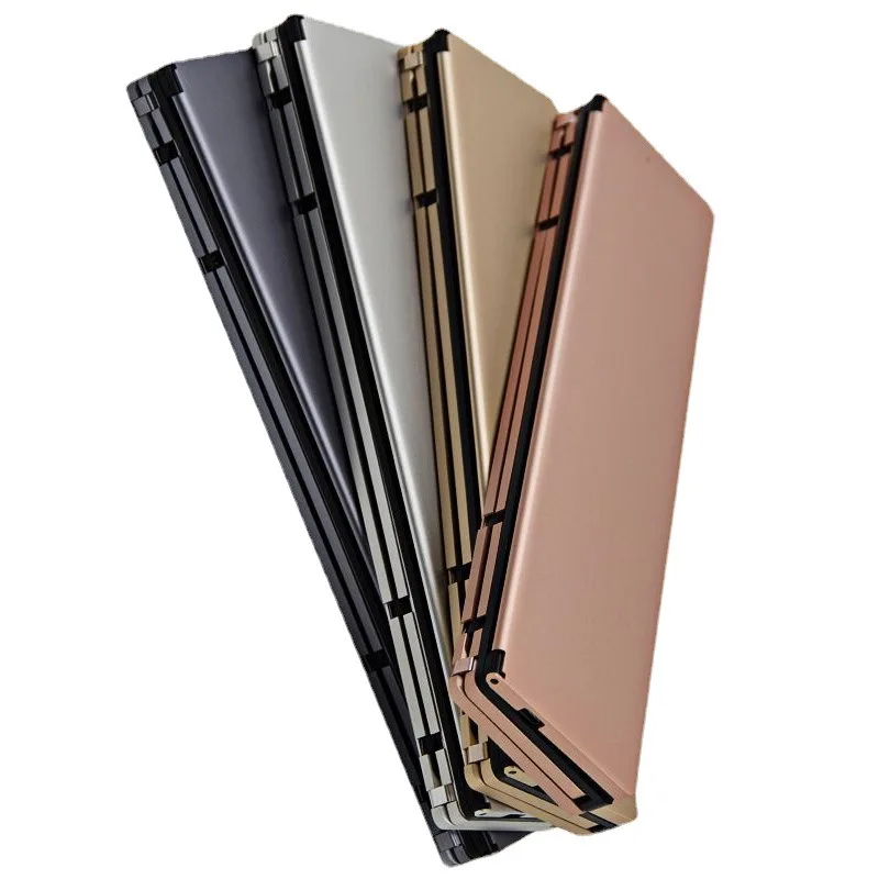 

Mobile phone, tablet, three systems, universal wireless Bluetooth keyboard, multimedia folding wireless keyboard gifts