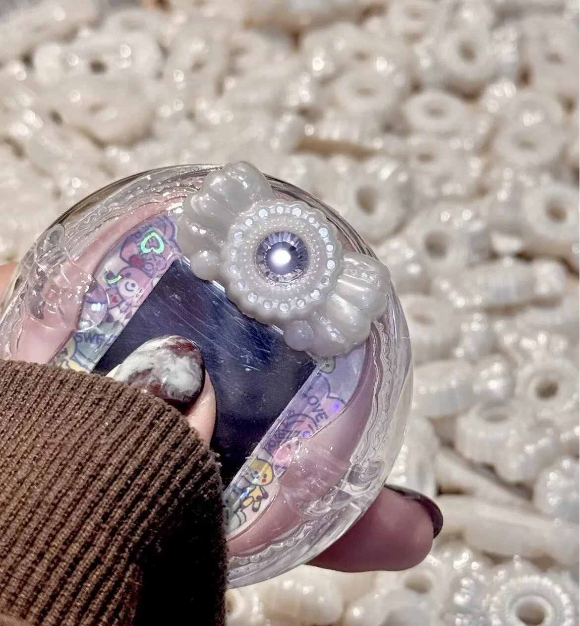 

Прозрачный защитный чехол Tamagotchi Uni Magic Changer с аксессуаром для лука