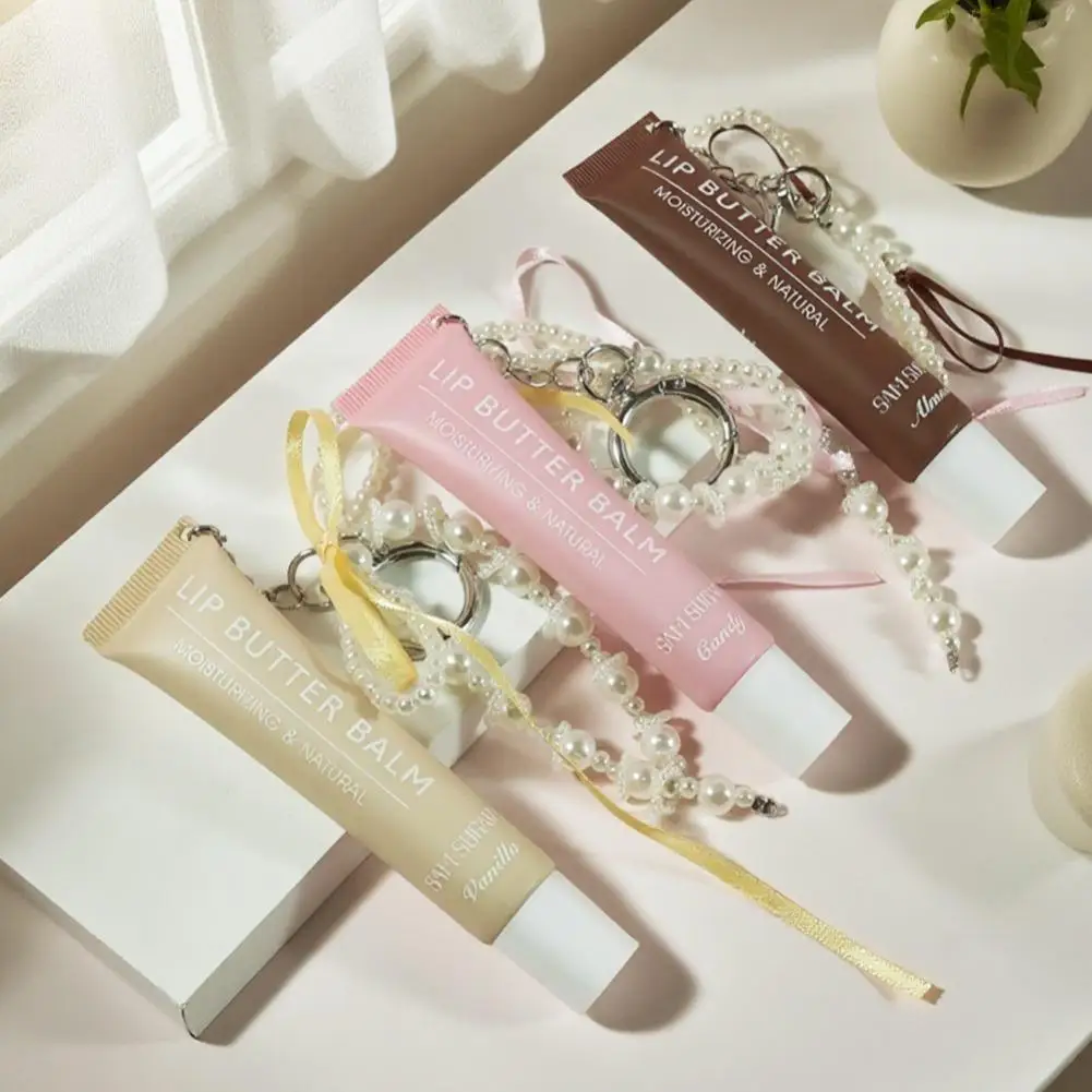 ลิปบาล์มเนื้อฉ่ำวาวแบบสายคล้องมุก กันน้ำ ติดทนนาน ให้ความชุ่มชื้น เงางามดุจกระจก เหมาะกับทุกสไตล์การแต่งหน้า