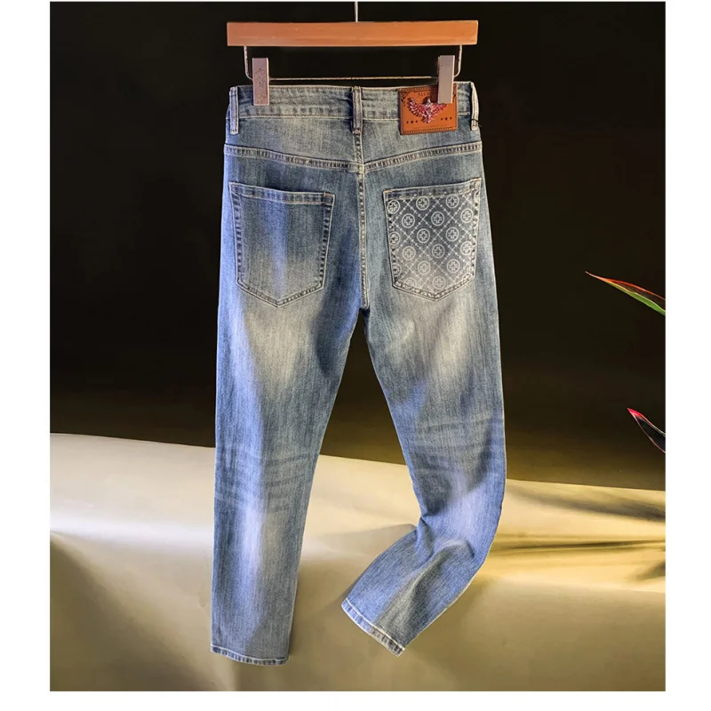 

High end light luxury men's jeans trend autumn new item slim fit small foot mid waist retro washed Korean version pants for men