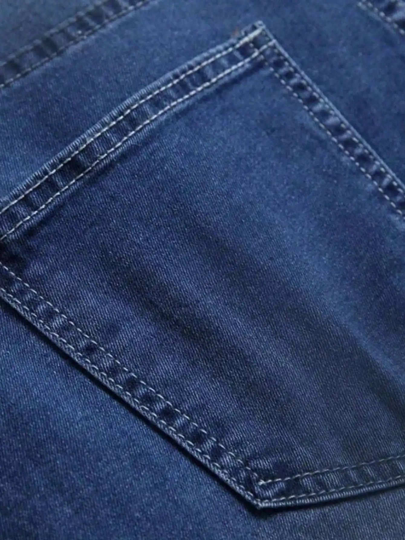 Men's slim fit jeans, tailored fit, long length jeans, multi pocket design, light pastel blue color, suitable for both work and