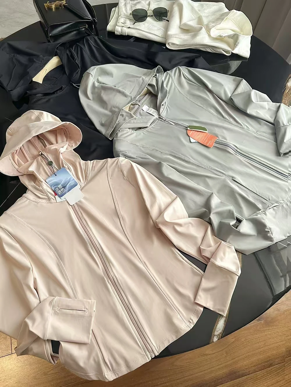 

High Quality UPF50 UV Protection Quick Dry Cool Feeling Ice Silk Hooded Short Length Women's Sun Protection Clothing Jacket