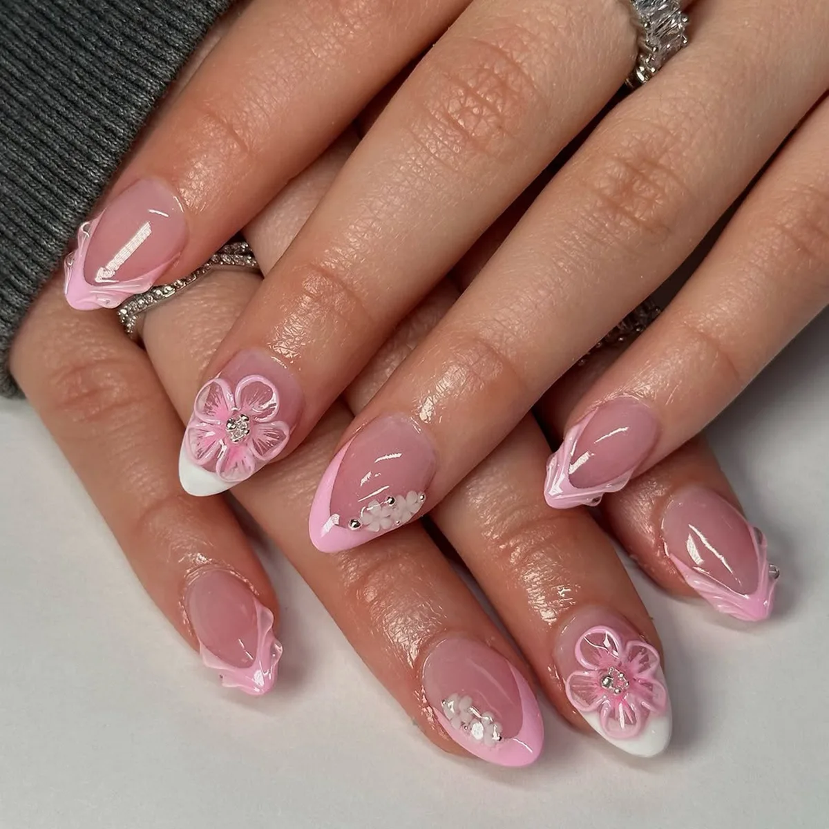 

24Pcs Short Almond Fake Nails with Pink White French 3D Flower Design Press on False Nails Oval Detachable Full Cover Nails Tips