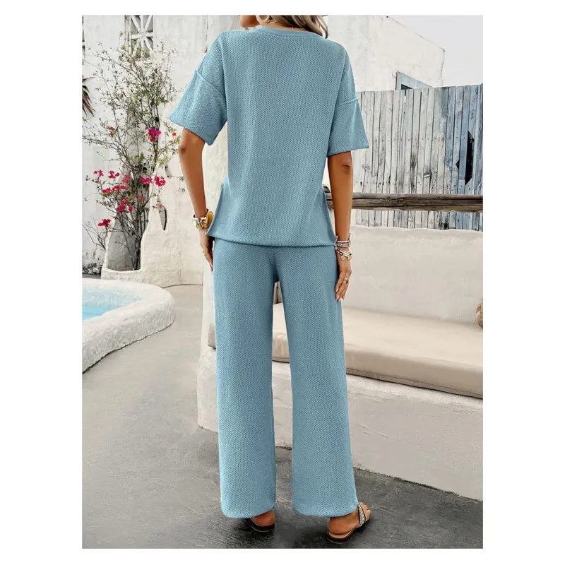 2025 Primavera/Verano moda nuevo estilo Casual Color sólido tejido pantalones de manga corta conjunto para mujer