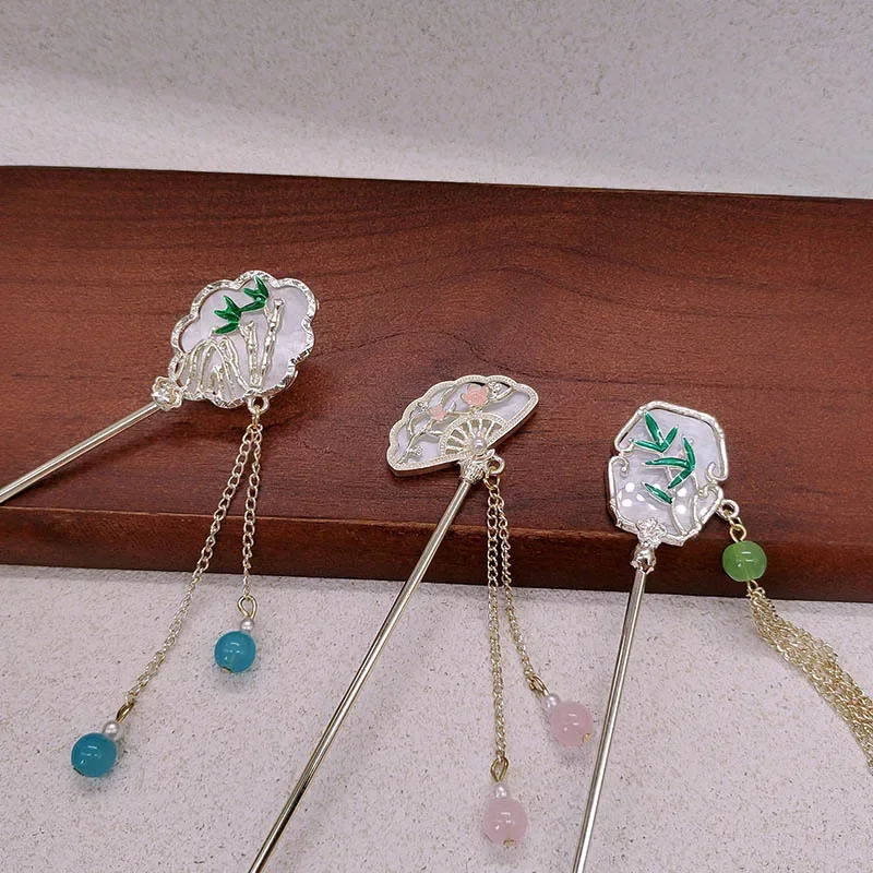 

Высококачественный нишевый новый высококачественный головной убор с кисточками в китайском стиле Hanfu из бамбукового листа, аксессуары для волос в древнем стиле