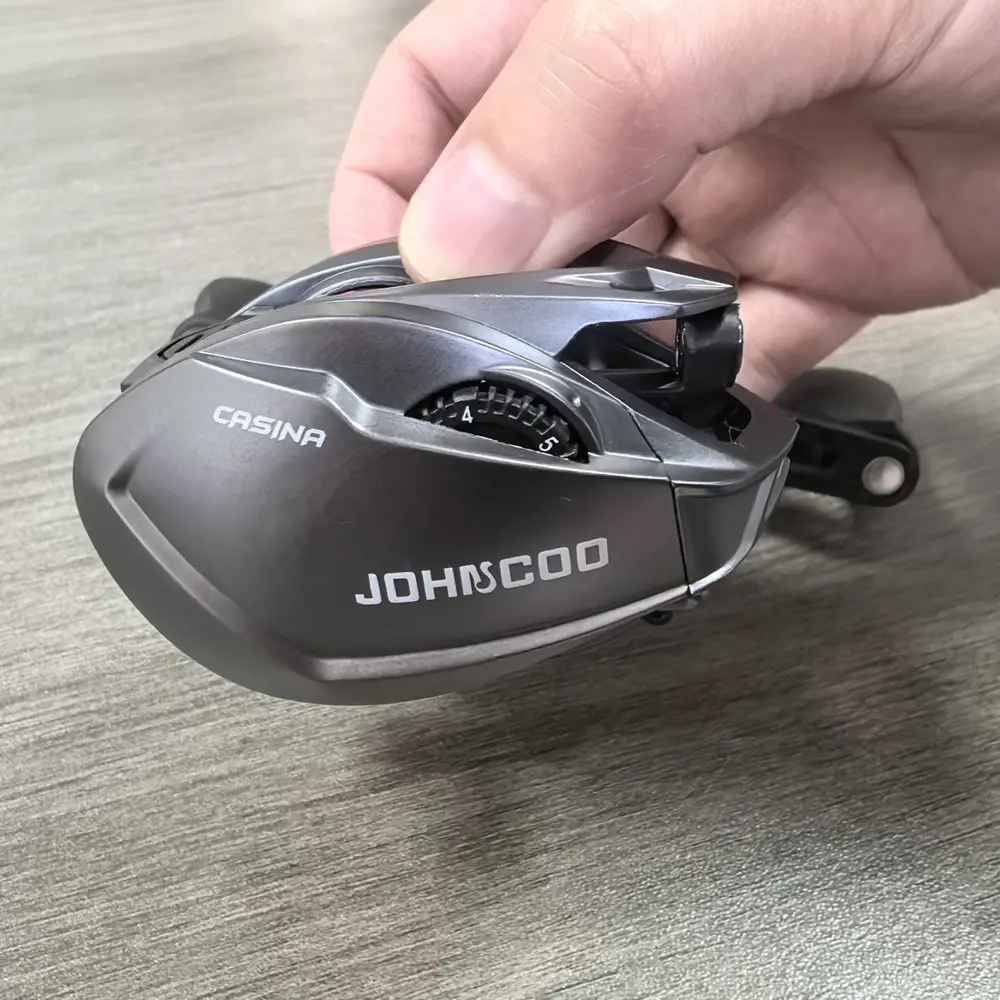 Carrete de pesca ligero con mango largo y cuerpo de carbono - imagen 2