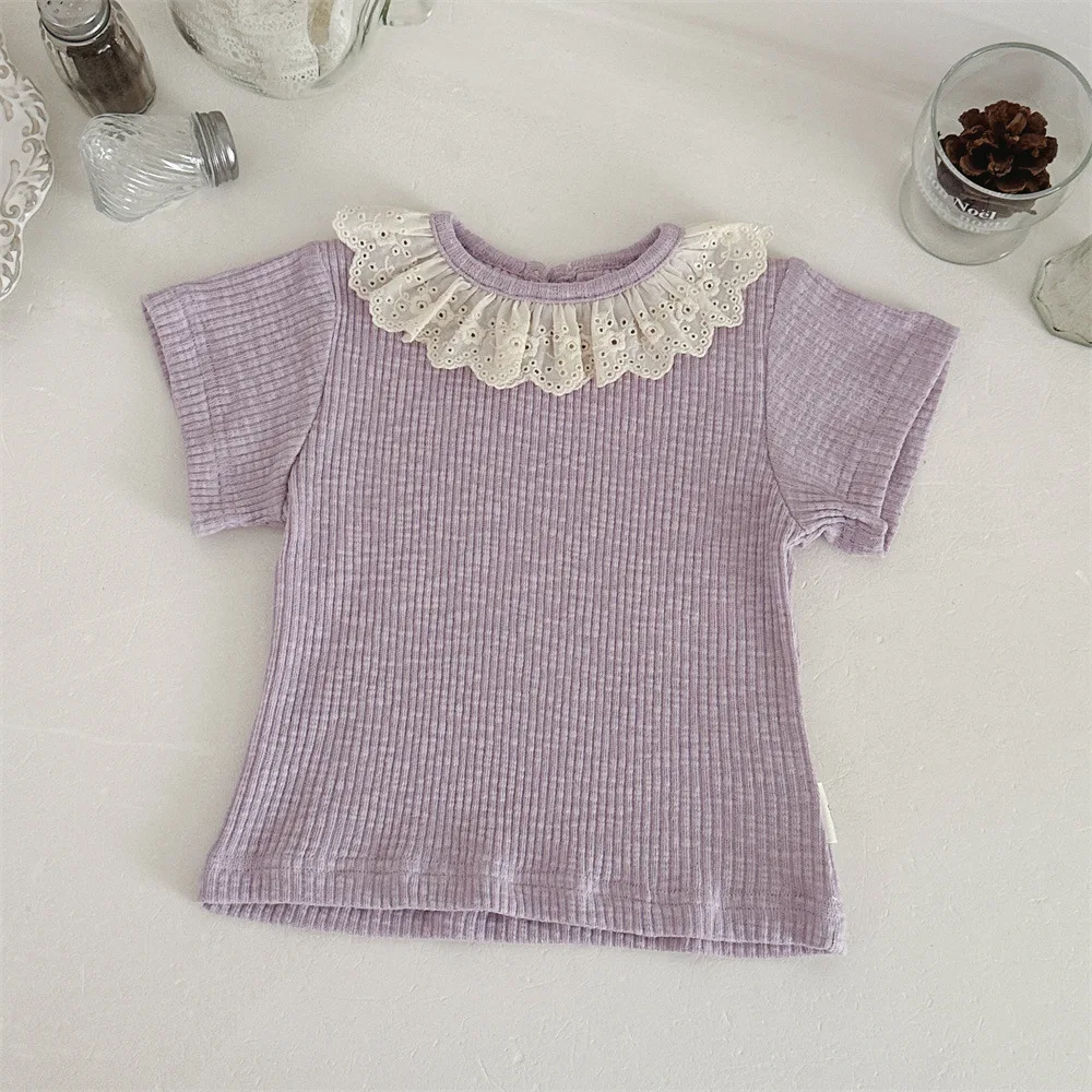 

Летние детские футболки с коротким рукавом 2026: милые кружевные воротники, однотонные эластичные топы в рубчик для девочек, одежда для малышей