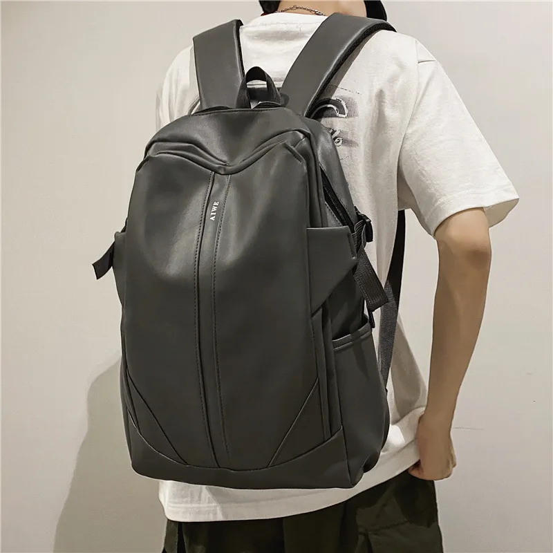 Einfarbig vielseitige weiche Leder Rucksack Unisex Schüler Schult asche große Kapazität Mode trend ige Reise Computer Rucksack