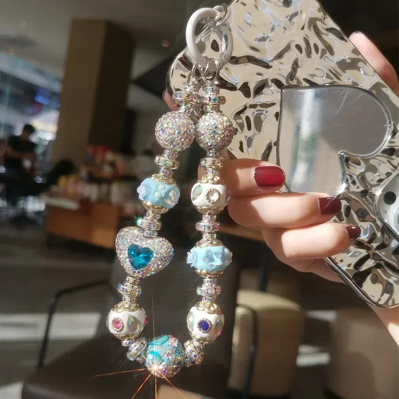 Mobile Phone Lashing Luxury Rhinestone Love Blue Tie Hand-beaded Hand Bead Chain Universal Shell Accessories Pendant Phone Charm