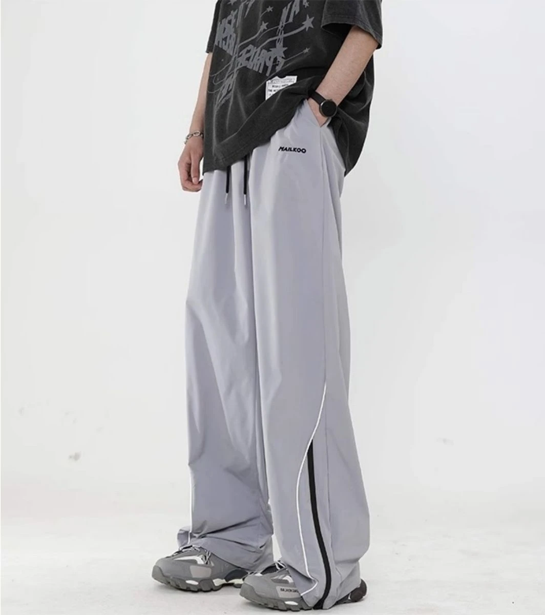 

Spring autumn Korean windbreak loose sports pants men fashion street Y2K couple personality retro wide leg straight leg pants