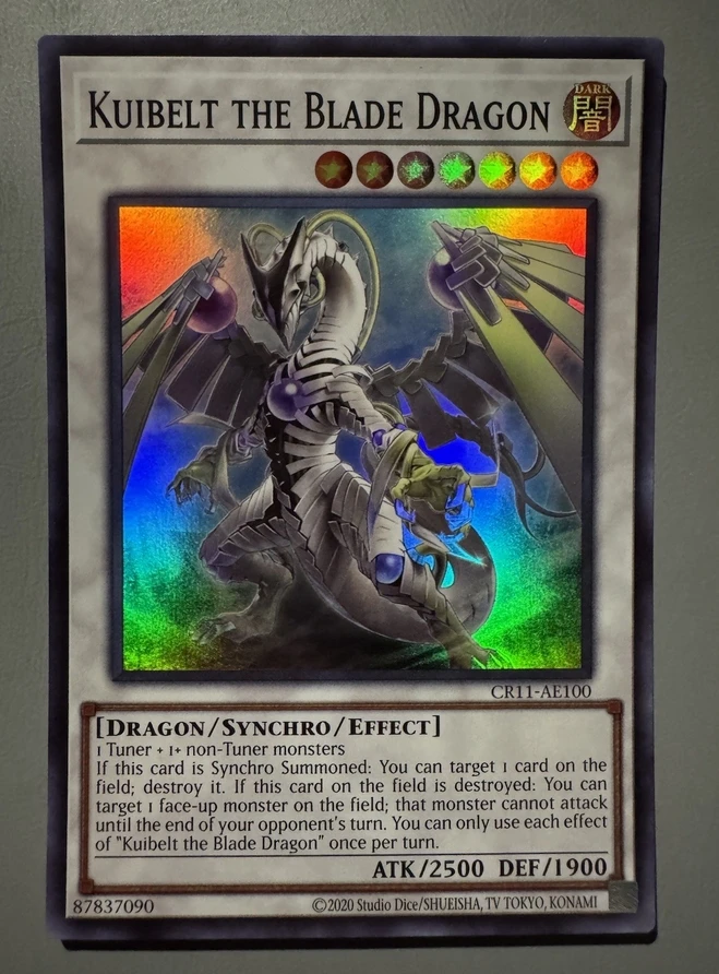

Yugioh KONAMI Duel Monsters CR11-AE100 Kuibelt the Blade Dragon Super Rare Asian English Collection Mint Card