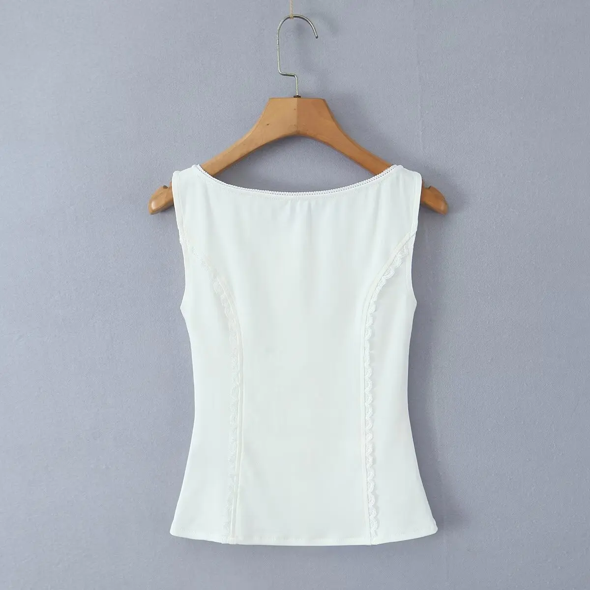 セクシーなアメリカンスタイルのレーストリムボタンベスト、スリムフィットのカーディガン、女性用、2025年春