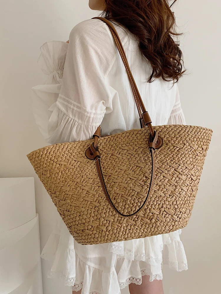 

New Fashion And Versatile Seaside Vacation Hollowed Out Woven Bucket Shaped Large Capacity Single Shoulder Tote Bag For Women