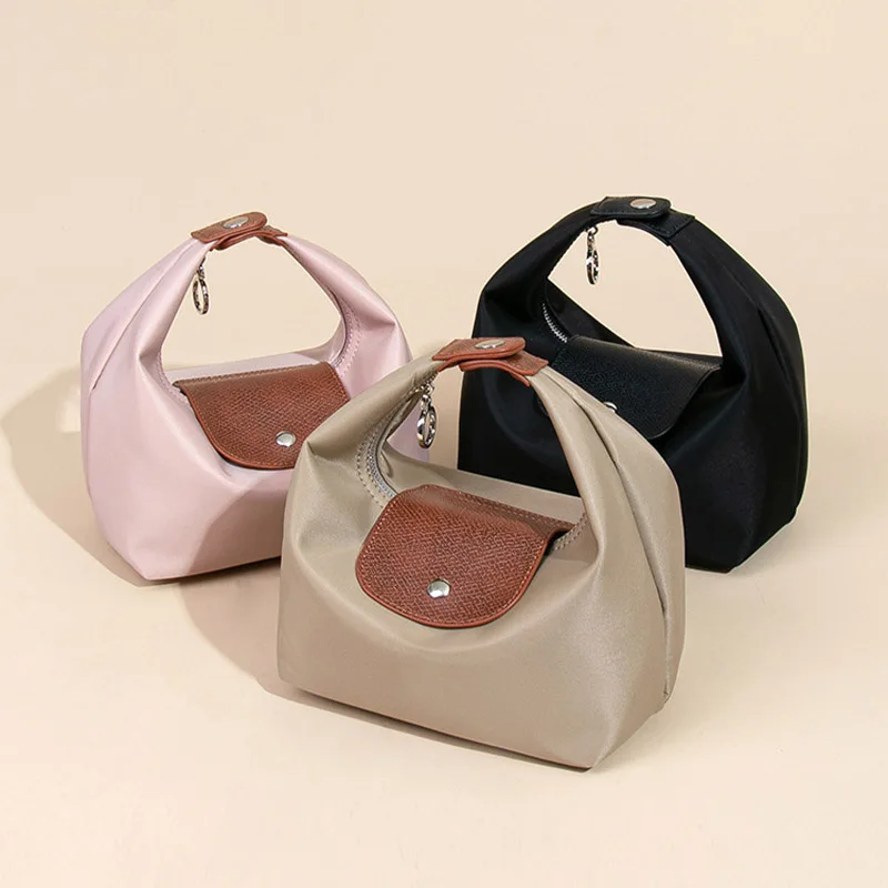 

New Korean Fashion Waterproof Nylon Lunch Box Off-Road Bag Women's Simple Casual Commuter Strap Dumpling Handheld Crescent Bag
