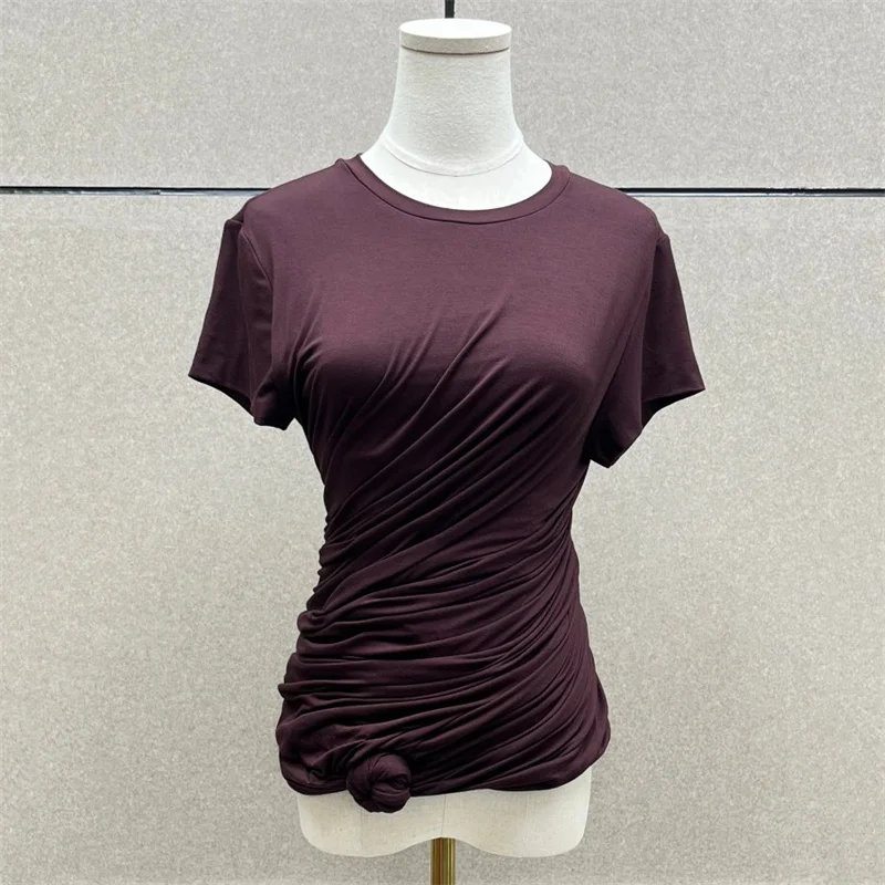 

Женская футболка: Новая эластичная облегающая модель с коротким рукавом для лета 2026 года, топ с асимметричными пуговицами и цветочным узором, 100% хлопок, корсетный крой.