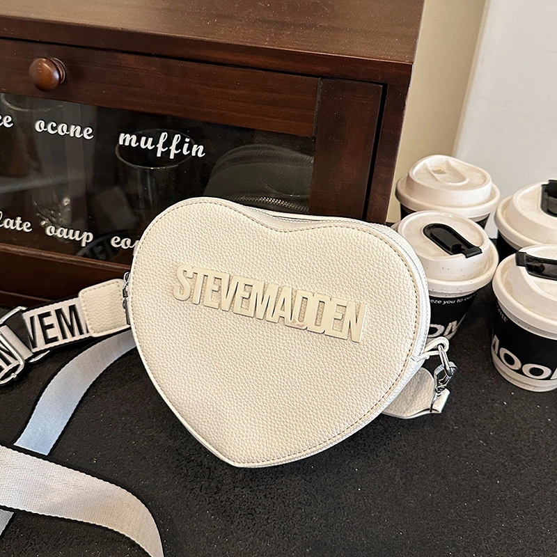 Contemporary Saddle Shoulder Bag In Buttery Soft Leather Streamlined Design For Gallery Visits And Business Luncheons