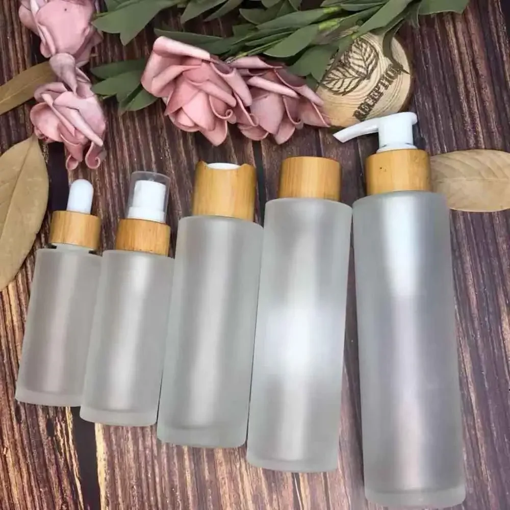 

frosted clear glass jar bamboo spray bottle with lotion spray cap carving wood cosmetic skin care cream jar with cap free sample