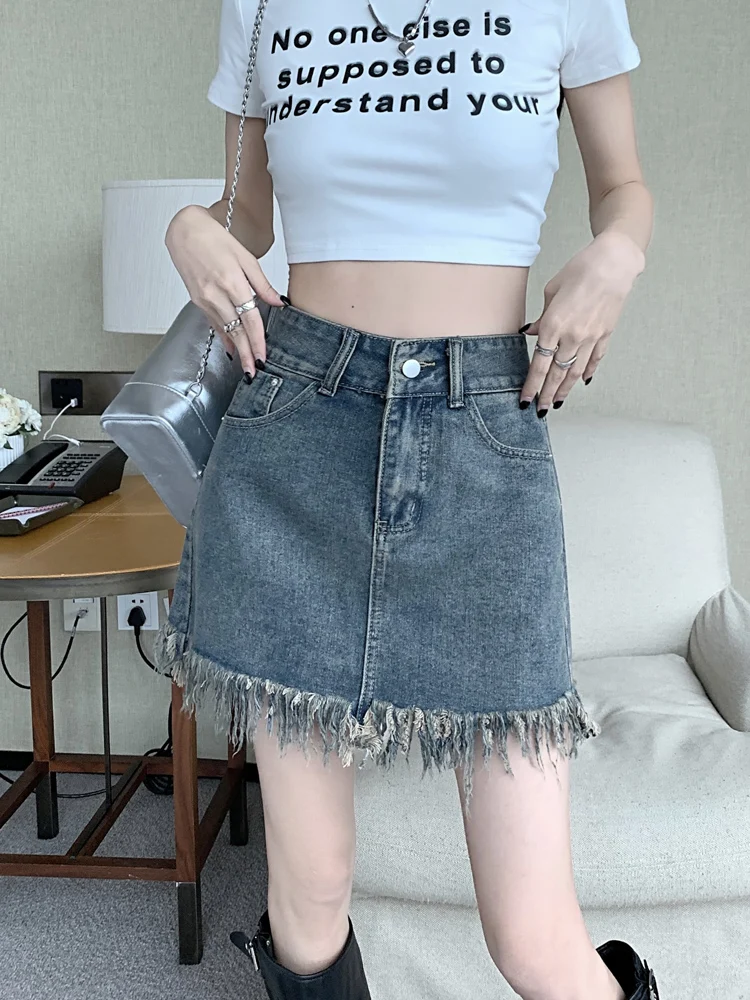 Gonna a trapezio a vita alta Gonne di jeans da donna Primavera Autunno Nuovo design Gonne coreane Sle ort con frange dimagranti