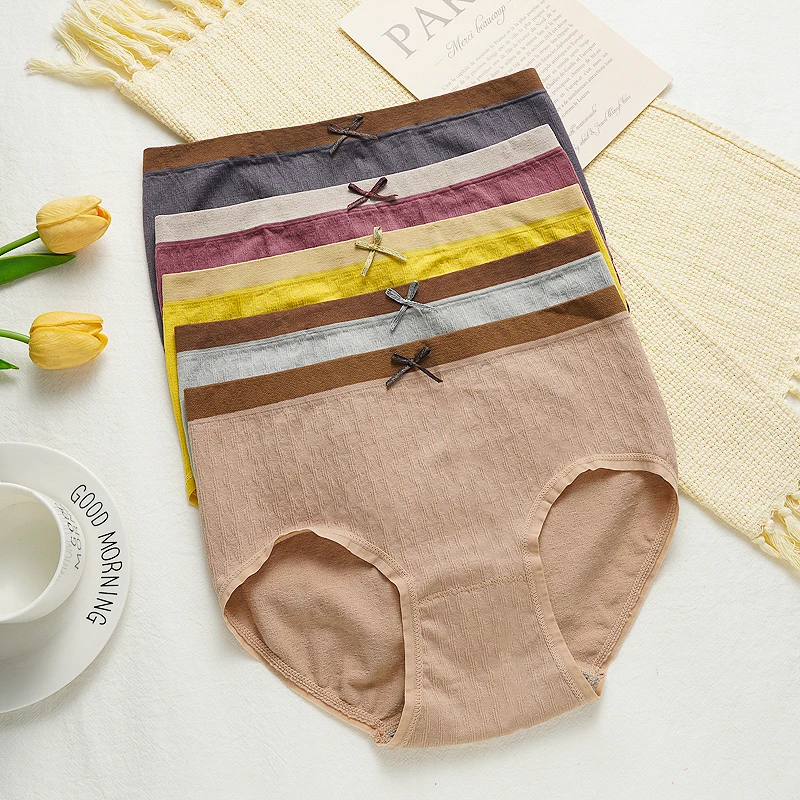 سراويل داخلية نسائية عالية التمدد ذات تغطية كاملة متوسطة الخصر بدون خياطة من مزيج القطن الملون بفيونكة مناسبة لـ 45-65 كجم