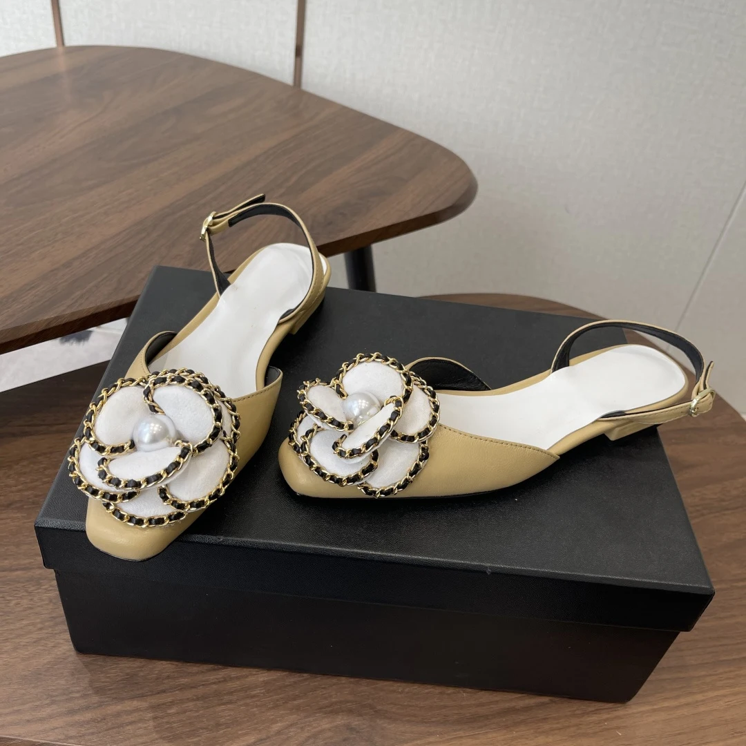 Women's Pearl-Embellished Flats chain detail demonstrating gold-plated brass construction and secure anchor points