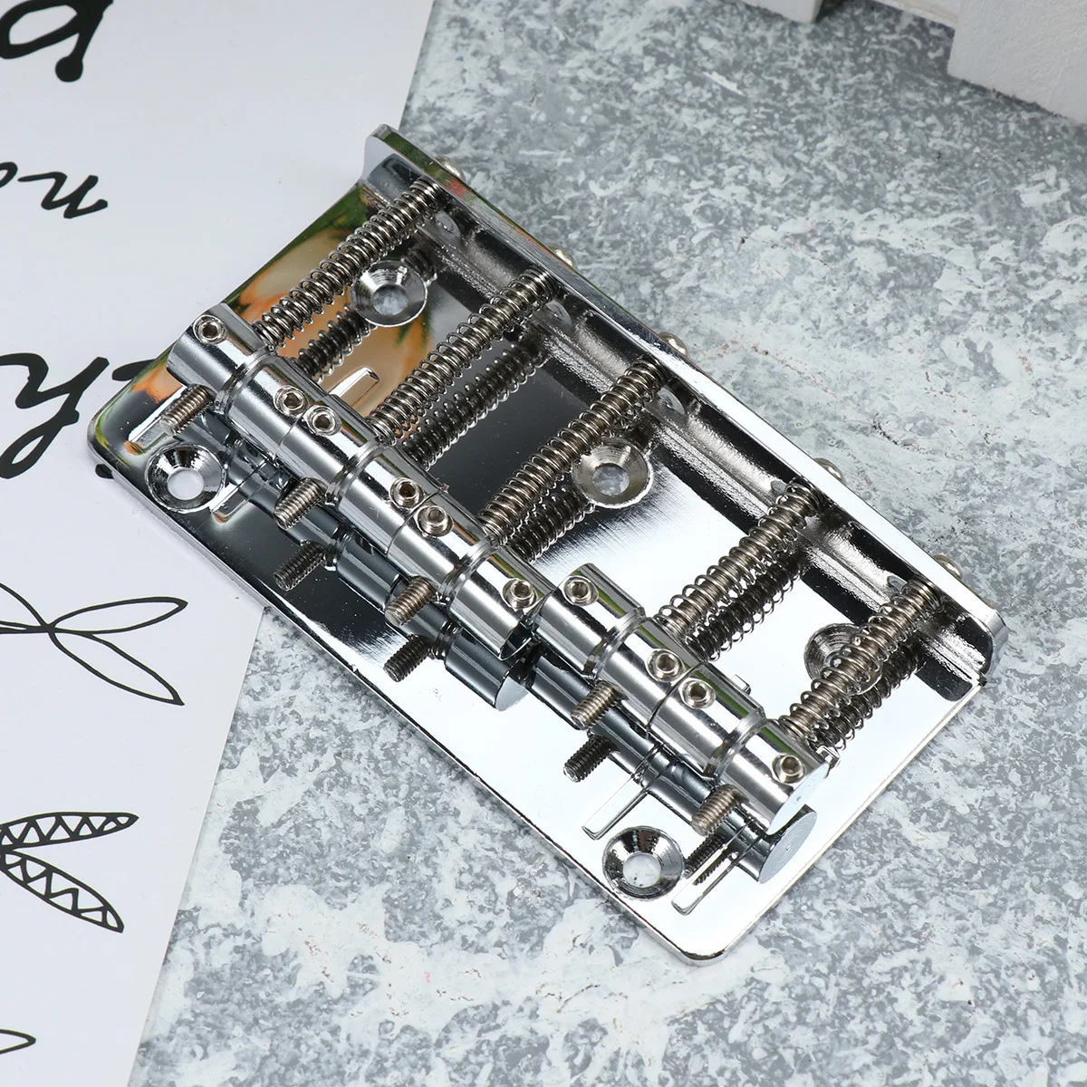 

1Set 5 String Metal Saddle Bridge Silver Precisely Shaped Slotted Pre-Drilled Easy Mount Ukulele Guitar Replacement Musical