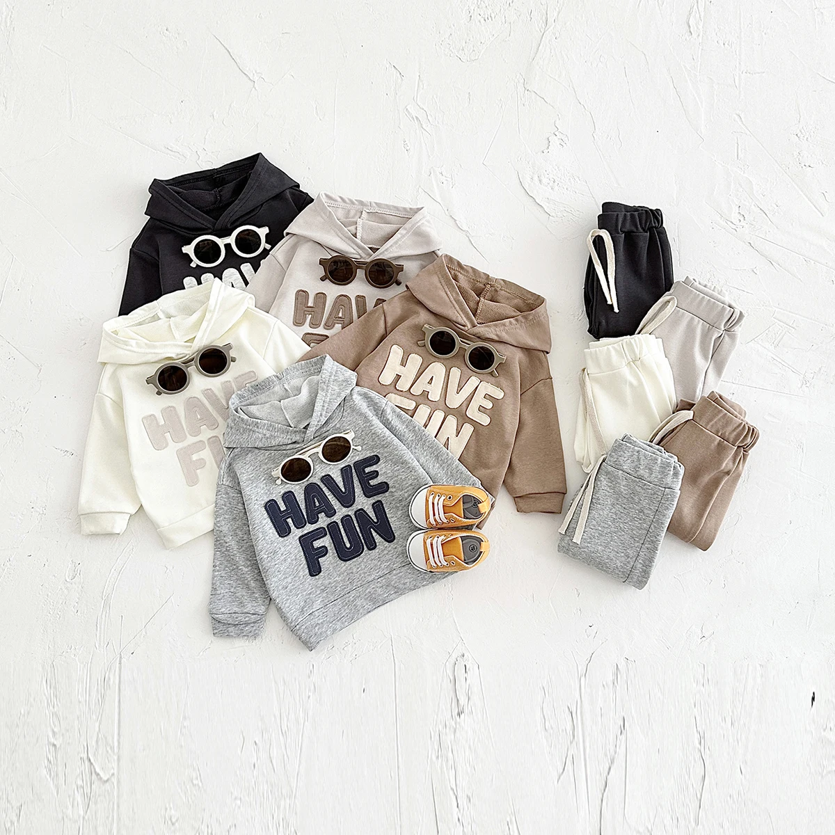 

INS Spring and Autumn New Boys and Girls Baby Sports Set Letter Patch Long Sleeve Hooded Sports Top and Trouser Two Piece Set