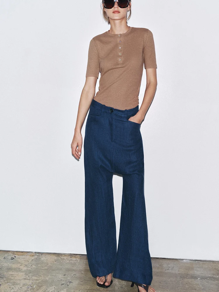 Nowa letnia kolekcja 2025 damska moda prosty okrągły dekolt prosty uniwersalny T-shirt z ozdobnymi guzikami do pracy elegancki...