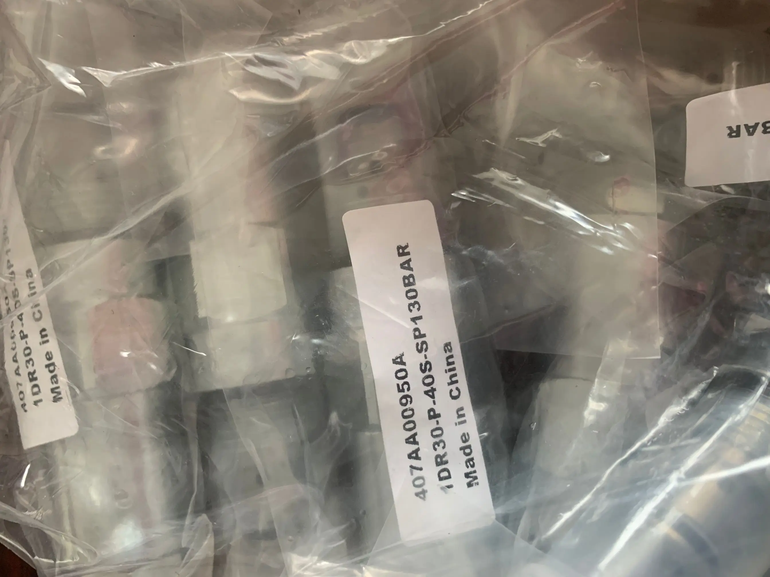 1DR30-P-40S-SP130BAR 407AA00950A صمام التفريغ ea ton vick ers IH خرطوشة صمام الأصلي صنع في المملكة المتحدة HYDRAFORCE SUN HYDRAUL