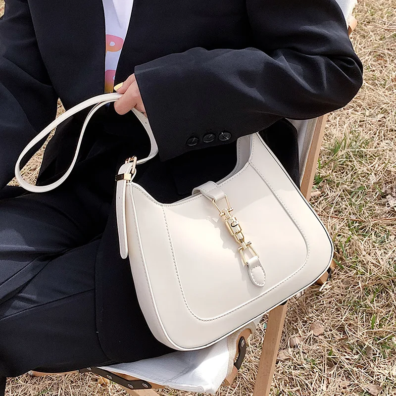 ​ Torba na ramię damska z kwiatowym wzorem na lato 2025, regulowany pasek na ramię, minimalistyczna, wodoodporna, niezbędna na miejskiej dojazdowości. ​