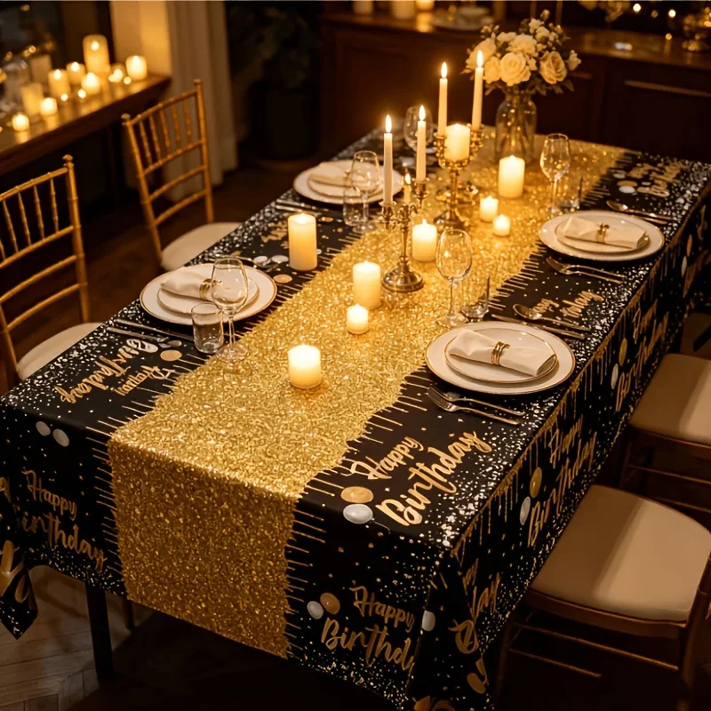 A set of birthday party tablecloths, in black and gold color scheme.PMJ