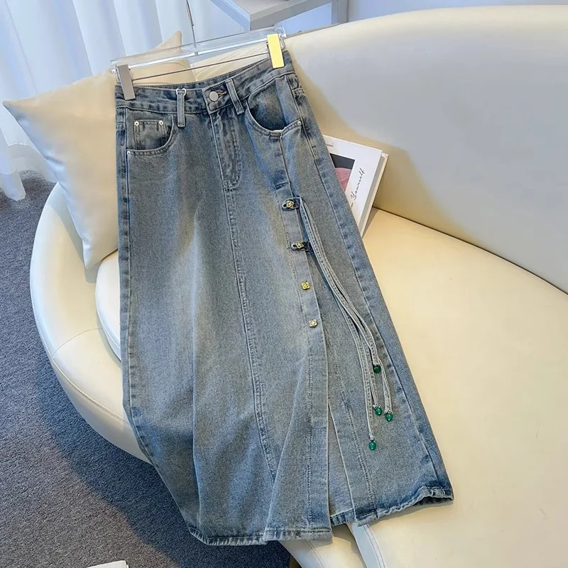 Gonna di jeans con fibbia stile cinese Donna Estate 2025 Nuova gonna a trapezio di media lunghezza divisa Temperamento Nappa Gonne slim tutte abbinate