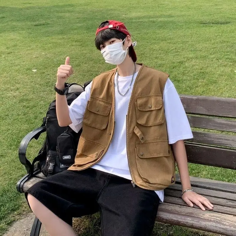 

Unisex Men's Summer Slim Fit Sleeveless Waistcoat Retro Workwear Vest with Pockets Layerable Jacket for Casual or Streetwear