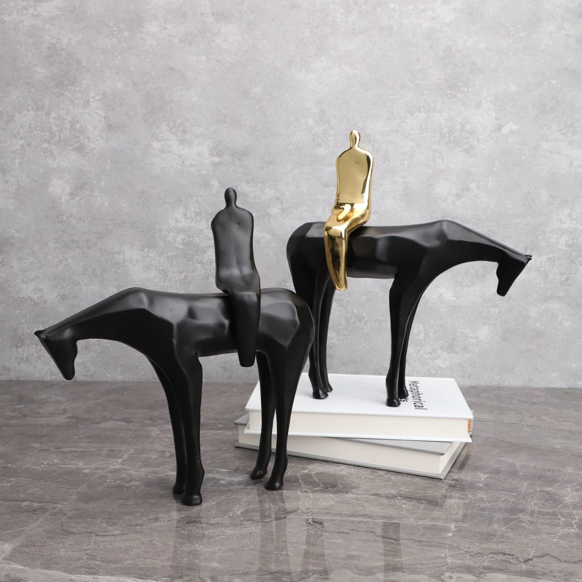 

Simple modern resin black gold man sitting horse sales department model tenant hall home study bedroom ornaments