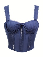 A royal blue lace trimmed steel ribbed strapless corset and a bow shaped double shoulder strap shaping women is top