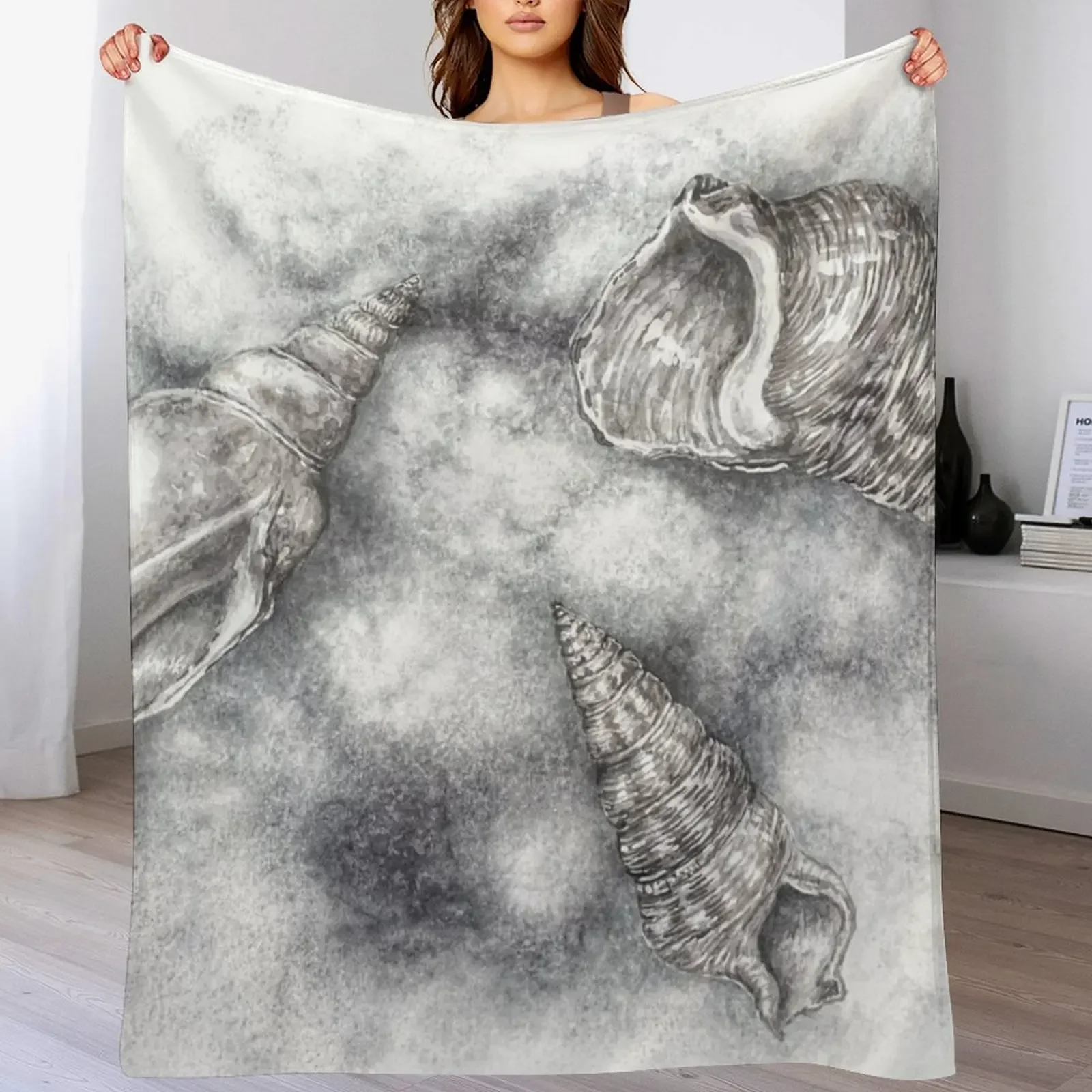 

Three shells living together in monochrome harmony. Throw Blanket Decorative Sofas Luxury Throw manga Blankets