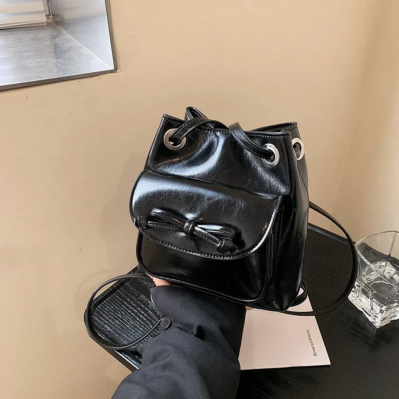 2025 جودة عالية بولي Bow القوس الصلبة مشبك المرأة حقيبة كروسبودي عيد الحب الحلو نمط بسيط حقيبة كتف دلو عصرية