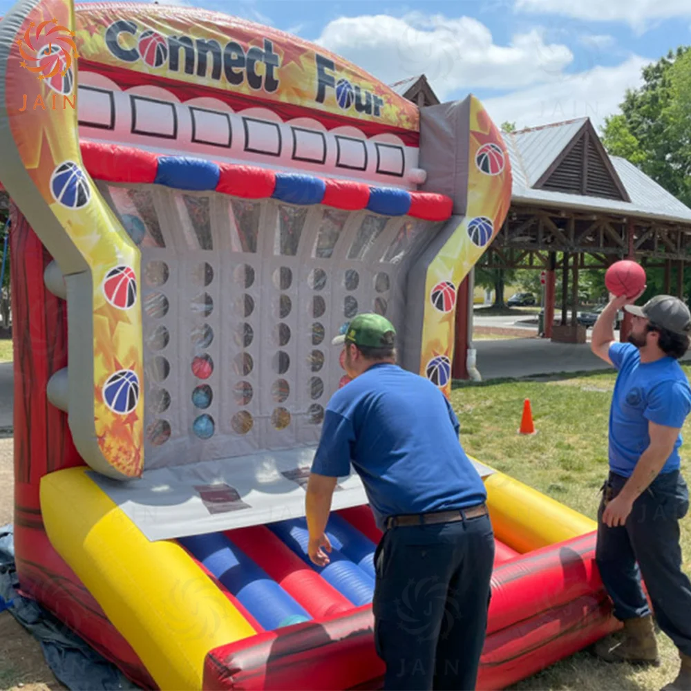 Nadmuchiwany kosz do koszykówki na wynajem na imprezy, nadmuchiwana gra Connect 4 z koszykówką, strzelanie do tarczy z dmuchawą na imprezy plenerowe.