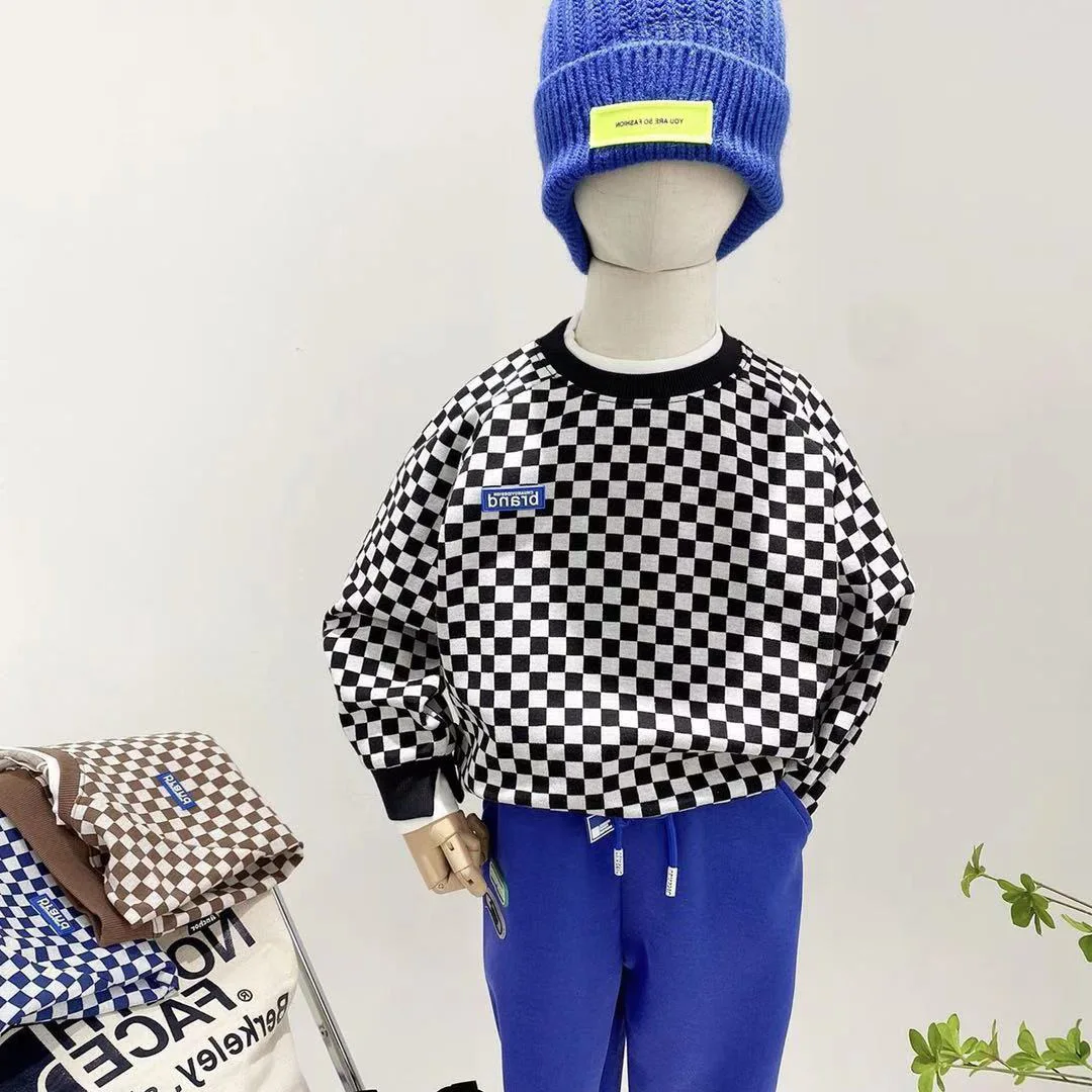 Boys and Girls Top Sweater 2024 Spring and Autumn New Childrens Fake Two Piece Casual Top Long Sleeved Childrens Clothing