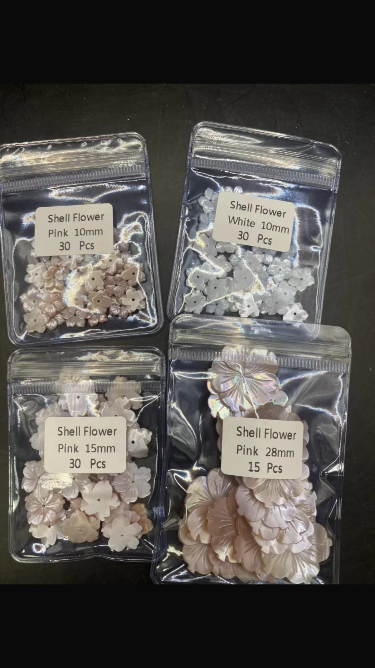 

Hot Sale Wholesale Shell Flower 10-30mm White Pink Black Yellow Welcome to Customize Any Product for Jewelry Handmade DIY