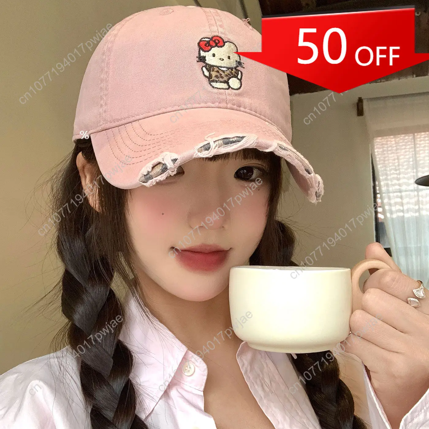 

Sanrio Hello Kitty Women's Pink Baseball Cap — Distressed, Ripped-Effect Wide-Brimmed Cap