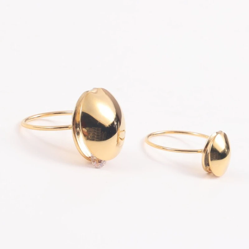 A Movable Zircon Ring Placed In The Middle.Stainless Steel Gold Color Ring