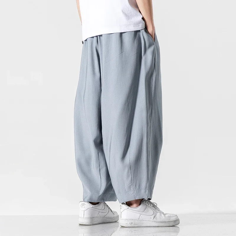 Nowe męskie spodnie haremowe w stylu Harajuku Casual dla mężczyzn spodnie Kpop bawełniane spodnie do joggingu damskie spodnie dresowe Streetwear jednolity kolor 5XL