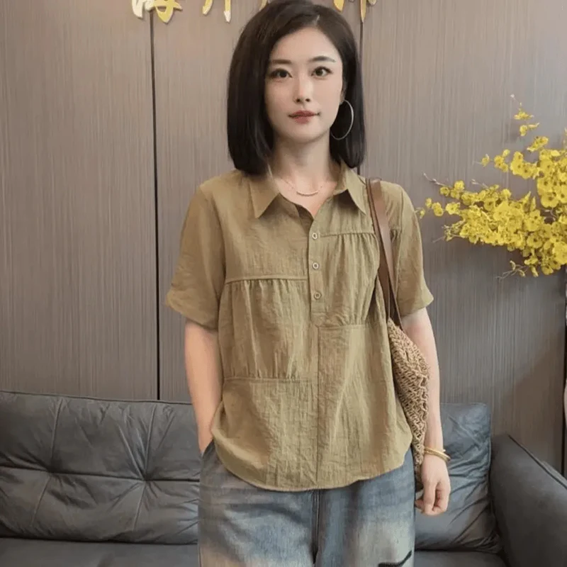 Mode revers épissé couleur unie plis Blouses vêtements pour femmes 2025 été nouveaux hauts amples décontractés chemises de banlieue