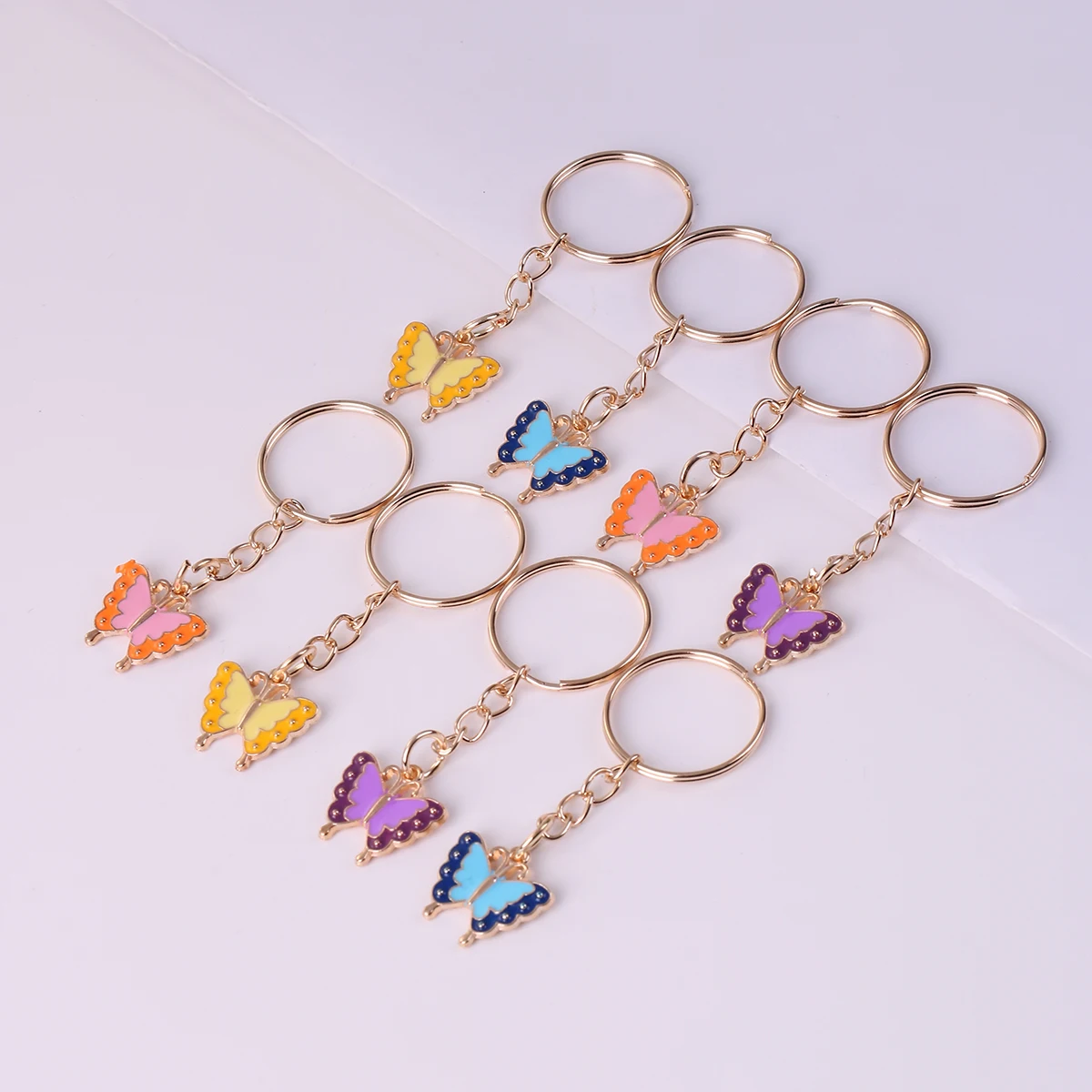 Porte-clés en métal papillon en alliage mignon, porte-clés étoile, décoration de portefeuille, sac à dos, pendentif breloques, cadeau de fête d'anniversaire, 8 pièces