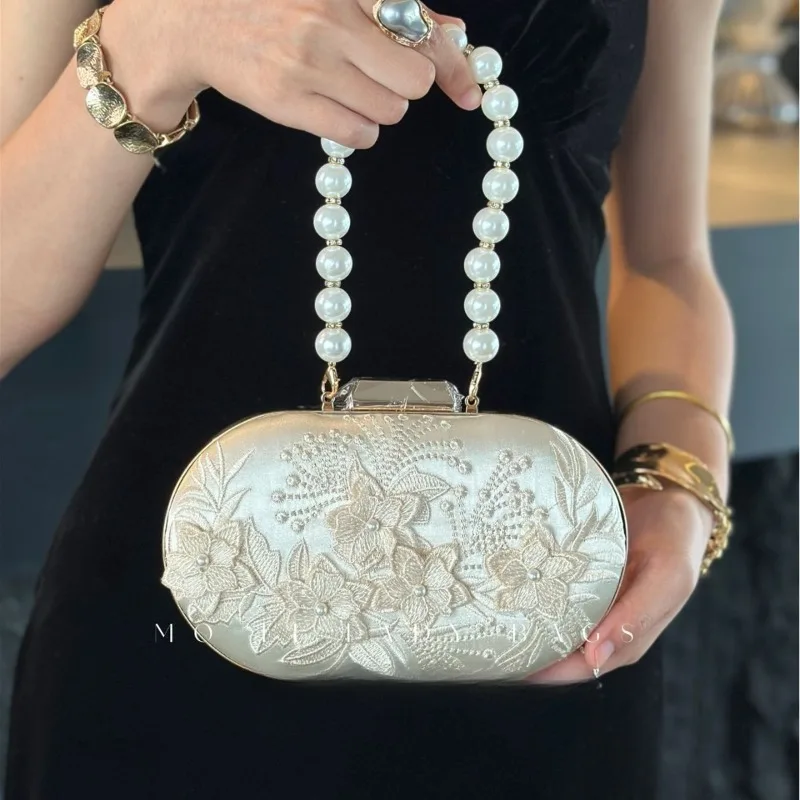 2026 New Women's Handbag Fashion High Quality Pearl Lace Women's Bag Advanced Retro Versatile Party Banquet Mouth Red Envelope