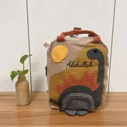 Mochila multifuncional con nombre personalizado para niños, mochila de Anime de dinosaurio, versátil, elegante, mochila de ocio para niños, bolsa de viaje