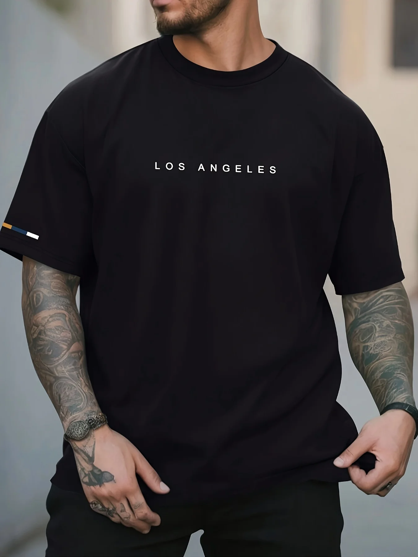 2025 لوس أنجلوس جرافيك طباعة الرجال العلامة التجارية الفاخرة القطن المعتاد قصيرة الأكمام الصيف للجنسين الرجال النساء بلوزة الشارع الشهير المحملة