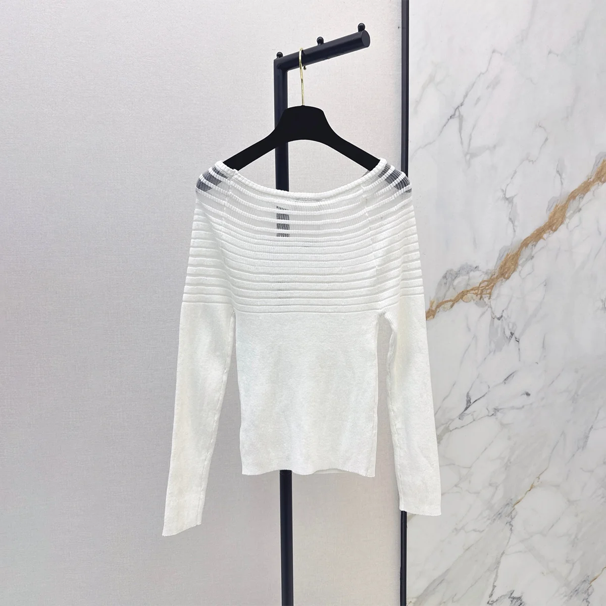 2026 High quality women's clothing with French atmosphere and off shoulder knitted base261013214